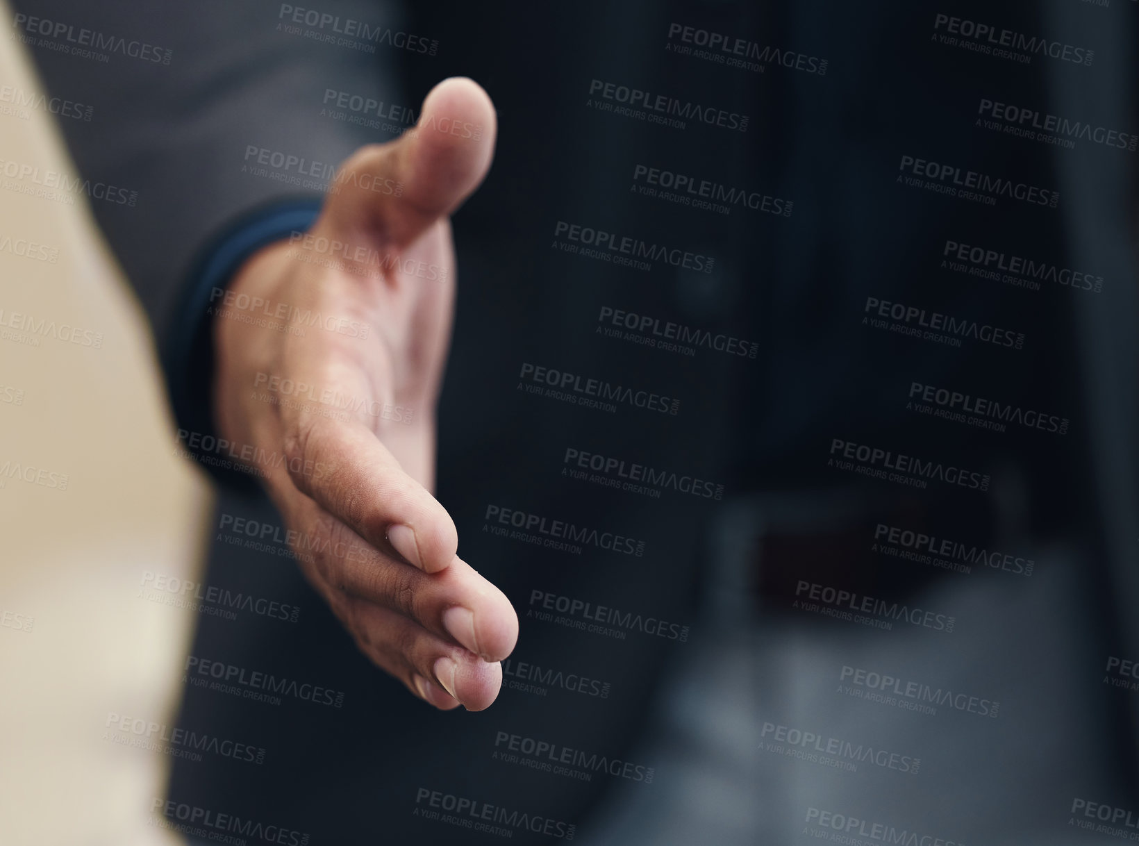 Buy stock photo Cropped shot of an unrecognizable businessman extending his arm towards the camera for a handshake