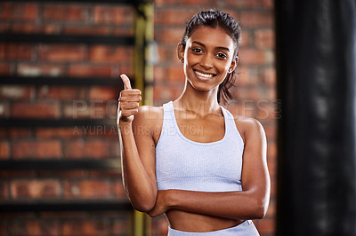 Buy stock photo Portrait, thumbs up and woman in gym, training or exercise goals with wellness, proud of progress and support. Face, person or girl in health centre, hand gesture or promotion with challenge and like