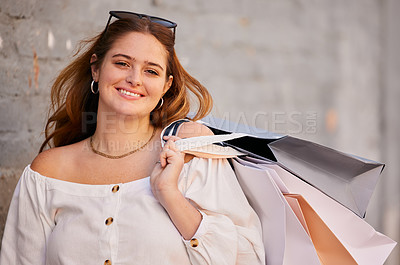 Buy stock photo Fashion, portrait or happy woman in town with shopping bags for retail sale, product offer or discount deal. Urban area, customer or girl in city with smile, financial freedom or choice on promotion