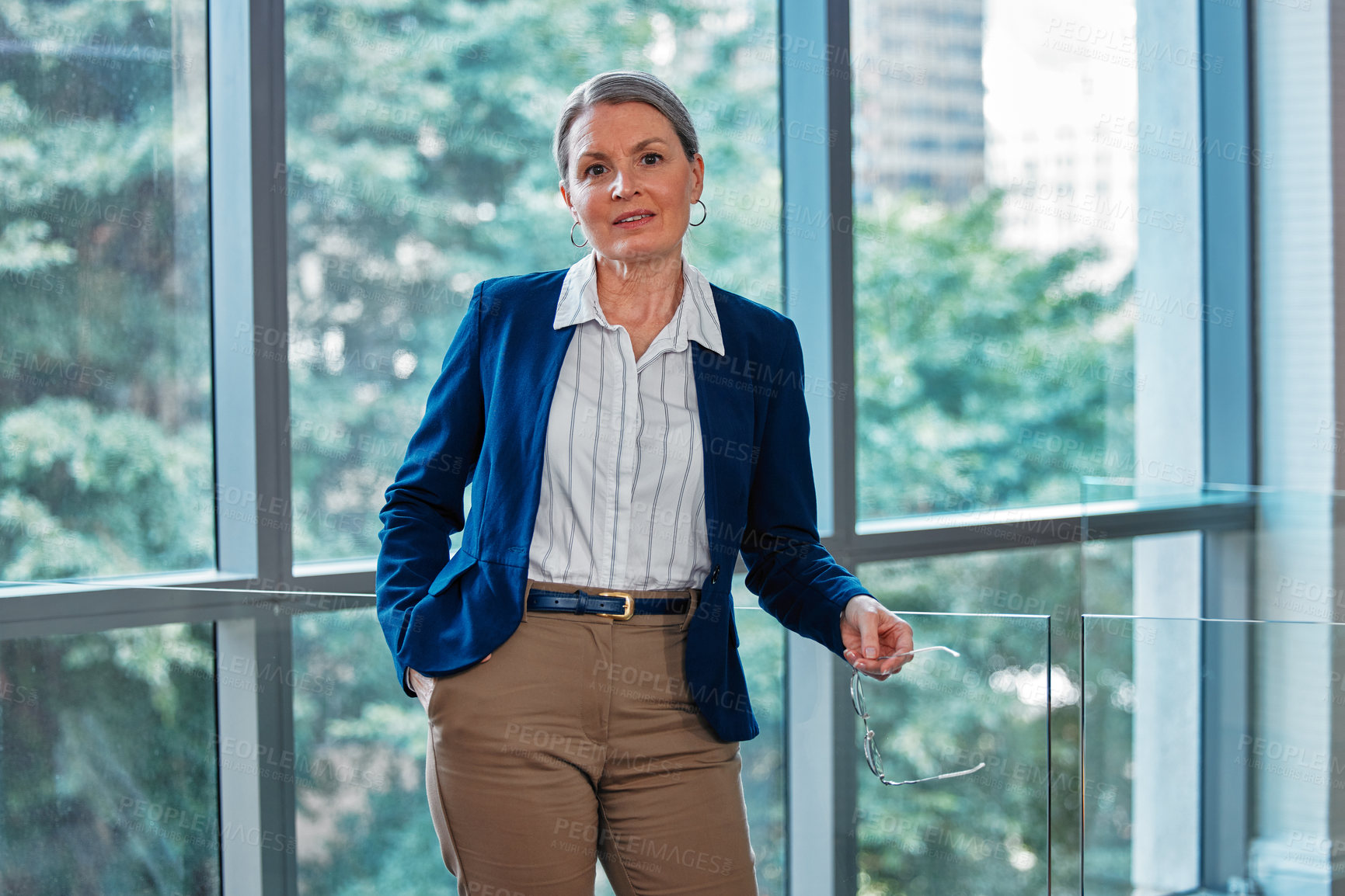 Buy stock photo Mature, portrait and woman in office building for business career, professional and positive mindset with ambition. Female entrepreneur or ceo of legal agency, affirmative action and corporate boss.