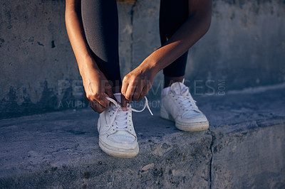 Buy stock photo Hands, fitness and tie shoes outdoor at steps to start workout, training or exercise in city. Sneakers, runner and person tying lace to prepare for sports, health or legs ready for wellness at stairs