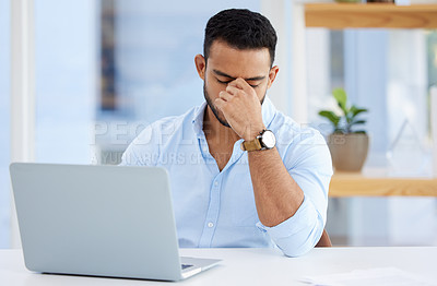 Buy stock photo Mental health, businessman with headache and laptop at desk at his workplace. Anxiety or depression, mistake and stress or frustrated male person sitting at table at his modern office at work