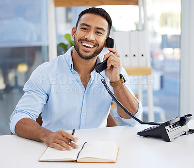 Buy stock photo Consultant, businessman writing in a notebook and on a phone at his desk at work. Customer support or service, contact and smiling male person using telephone with writing book at his workplace