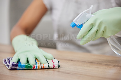 Buy stock photo Cleaning, bottle and person spray surface for disinfecting furniture for hygiene, dust and housework. Housekeeper or maid, detergent and cloth for wiping, bacteria and germs in apartment house