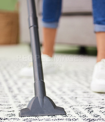 Buy stock photo Person, closeup and vacuum for carpet in home, living room and services for dirt, hygiene and dust. Machine, floor and cleaner with feet in lounge, rug and spring cleaning for bacteria in apartment