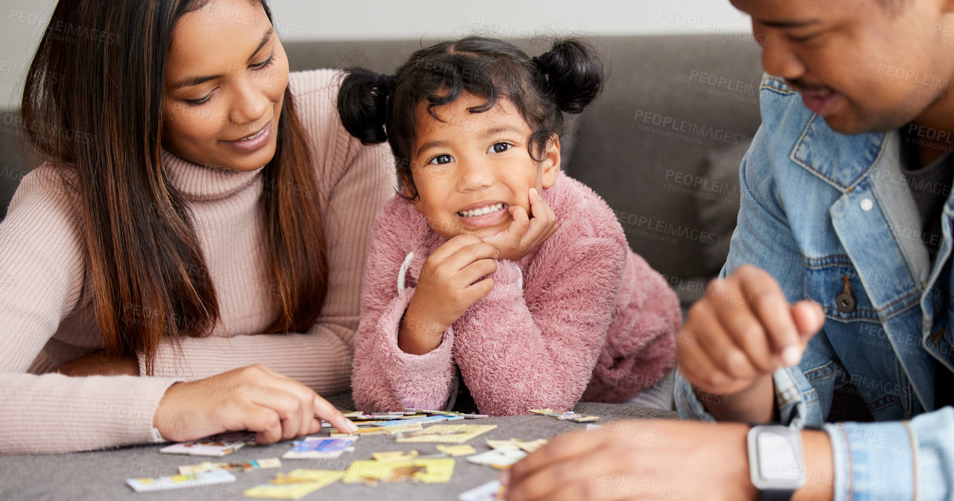 Buy stock photo Parents, girl and happy in portrait with puzzle in home for learning, development and love with bonding. Father, mother and daughter for games, teaching and problem solving at family house in Bogota