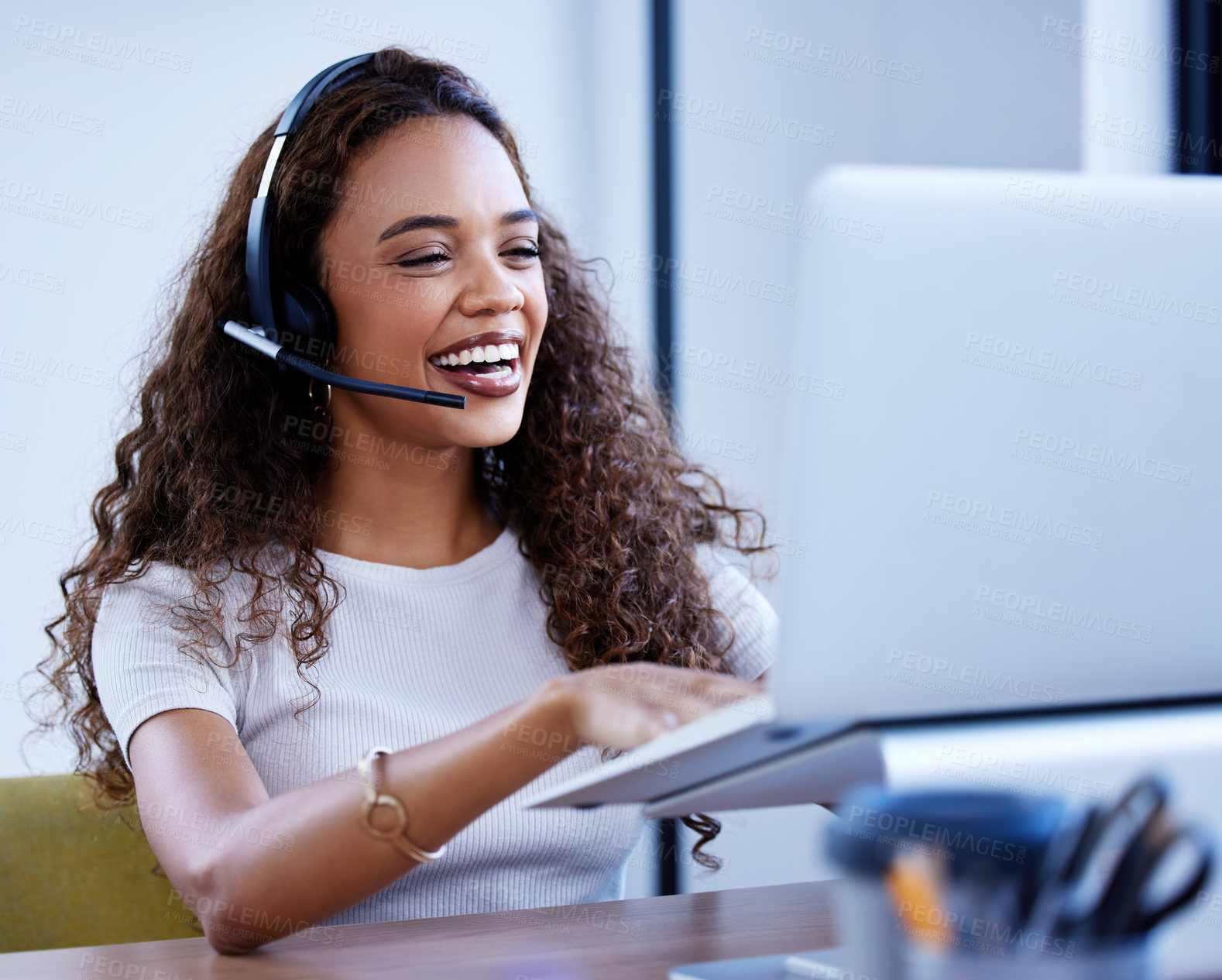 Buy stock photo Laptop, call center and funny woman consulting in office for customer service. Contact us, computer and African female sales agent, consultant telemarketing or crm, support or help, advice and happy.