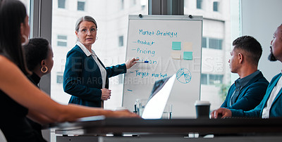 Buy stock photo Shot of a mature businesswoman giving a presentation at work
