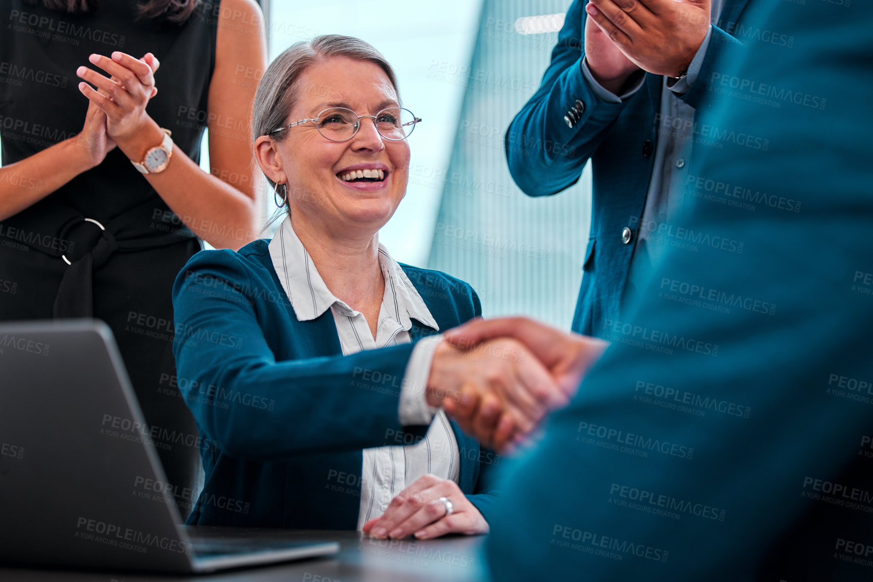 Buy stock photo Laptop, applause and businesswoman with handshake, smile and boardroom for negotiation, boss and client. Collaboration, partnership and meeting for project, agreement and publicist for politics