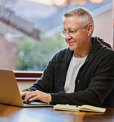 Buy stock photo Laptop, typing and senior man in home office for remote work, reading email or ebook. Computer, freelancer and mature person on internet at desk for news, report or search  project online in house