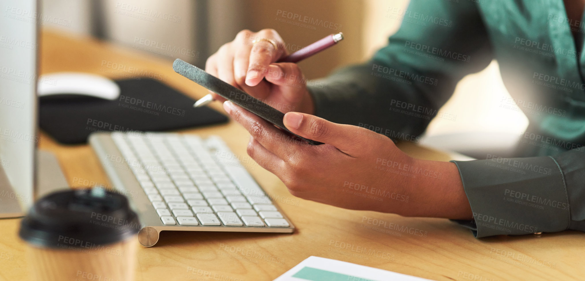 Buy stock photo Shot of a businesswoman using her smartphone at her desk