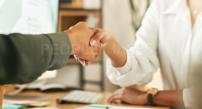 Buy stock photo Shot of two businesswoman shaking hands in greeting