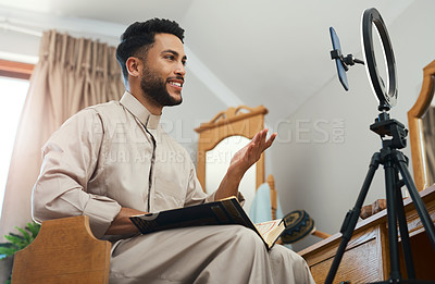 Buy stock photo Shot of a young muslim man busy recording his for her vlog