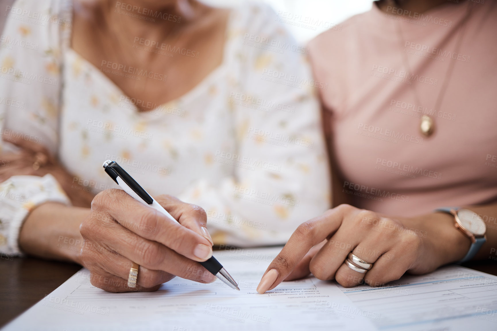 Buy stock photo Document, pen and closeup of a woman signing a retirement contract or application with a pen. Zoom of a female person with signature for pension paperwork, form or agreement with professional lawyer.