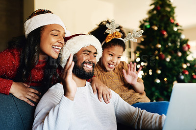 Buy stock photo Christmas, family and video call, wave and communication for holiday celebration with laptop and happy family from Mexico. Technology, virtual and celebrate, Christmas tree decoration and talk online