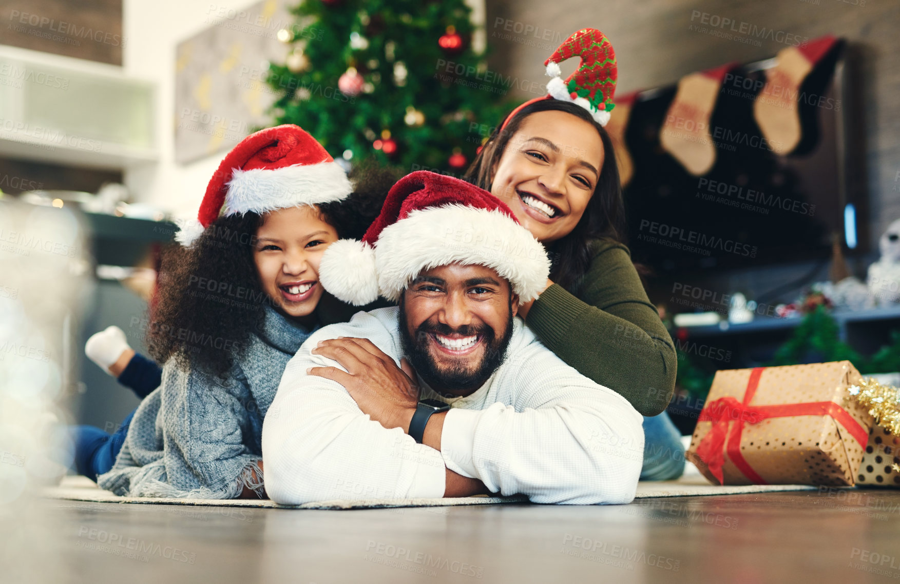 Buy stock photo Christmas, portrait and happy family, living room floor and ground, winter celebration and love, care and happiness together. Parents, girl and excited child celebrate festive holidays in home lounge