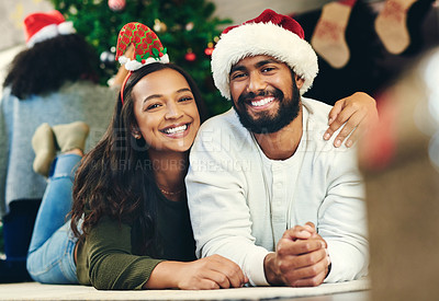 Buy stock photo Portrait of happy, christmas celebration and couple relax on floor of living room in apartment home. Festive party, holiday bonding and xmas vacation magic with man, woman in love and smile together 