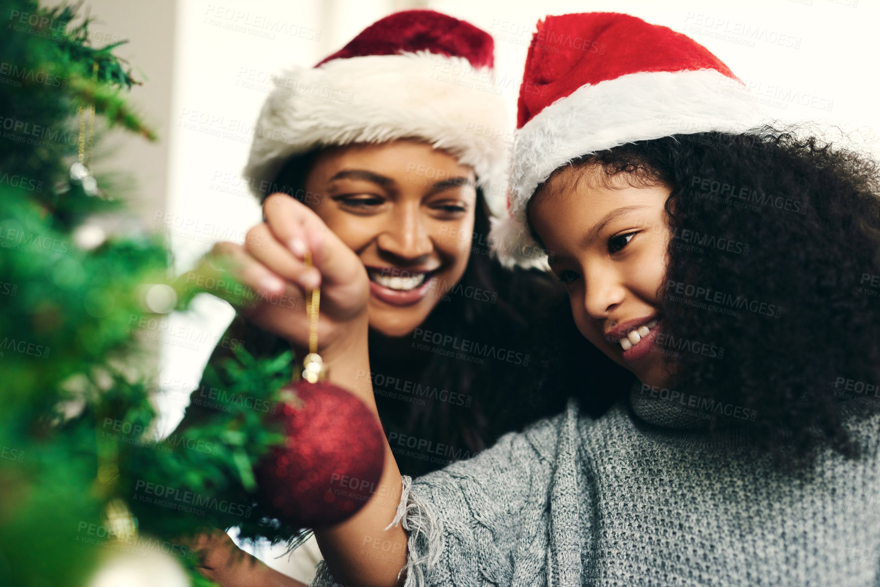 Buy stock photo Black family, holiday and happy christmas tree decoration for  celebration, bond and togetherness. Happy, mother and daughter together in home with smile excited for festive holiday in Canada.