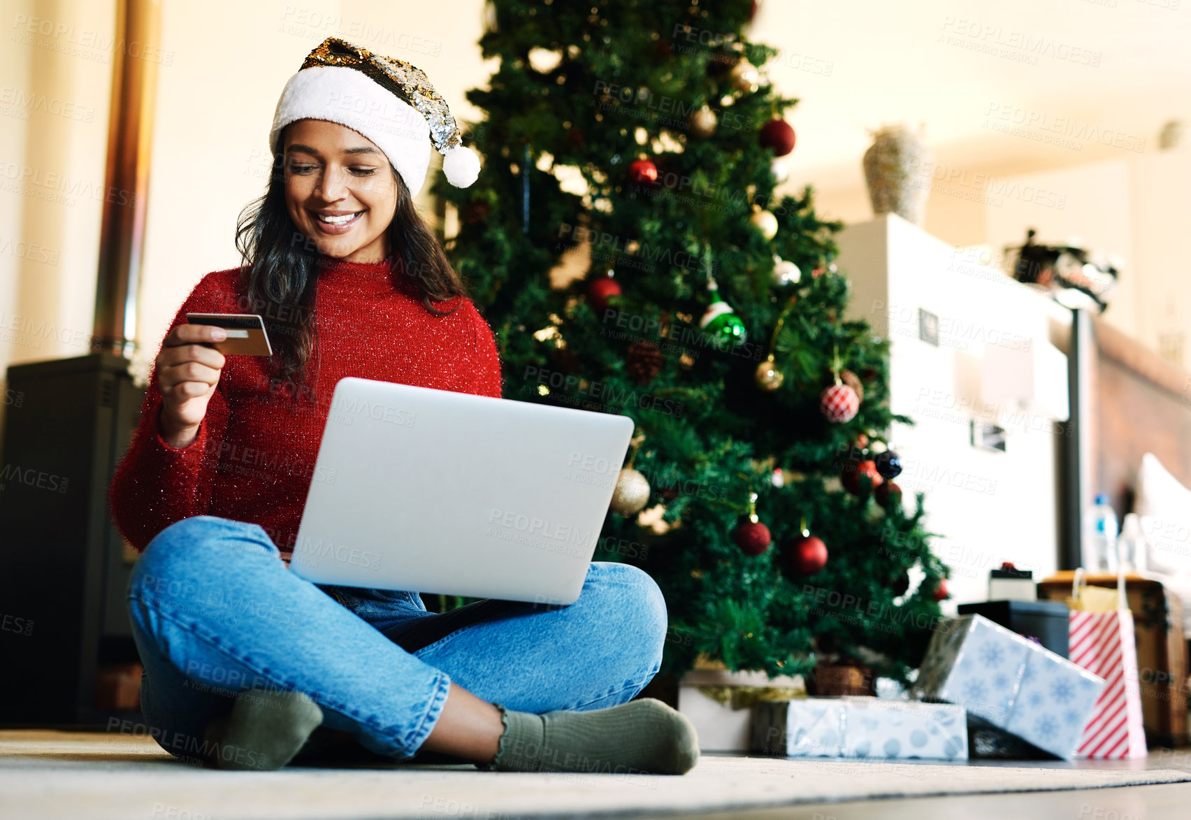 Buy stock photo Woman, laptop and online shopping for christmas with credit card in living room. Ecommerce payment, online retail customer and xmas shopping gifts on computer website to celebrate holiday vacation
