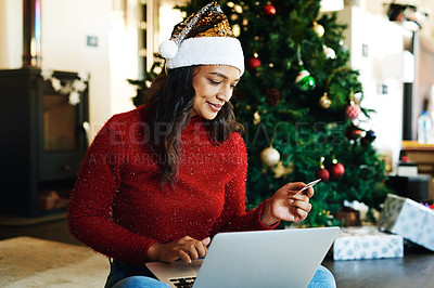 Buy stock photo Woman, laptop and credit card in ecommerce for Christmas gift, online shopping or banking at home. Happy female using computer and bank card for digital transaction, purchase or payment for presents
