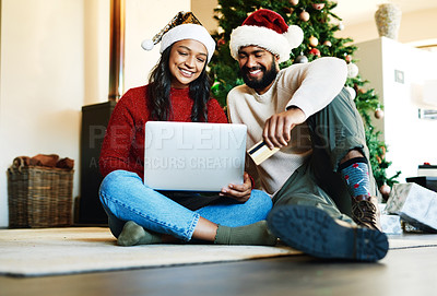 Buy stock photo Laptop, credit card and couple online shopping for christmas gifts together sitting on the floor at home. Ecommerce, deals and young man and woman making sales purchase for xmas presents on computer.