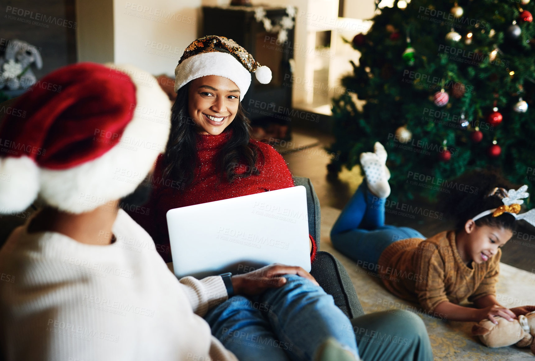 Buy stock photo Christmas, holiday and man and woman with laptop on sofa enjoy freedom, vacation and festival celebration with child. Family, love and parents with computer sitting with girl in living room together