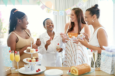 Buy stock photo Shot of a group of women eating dessert while celebrating at a friends baby shower