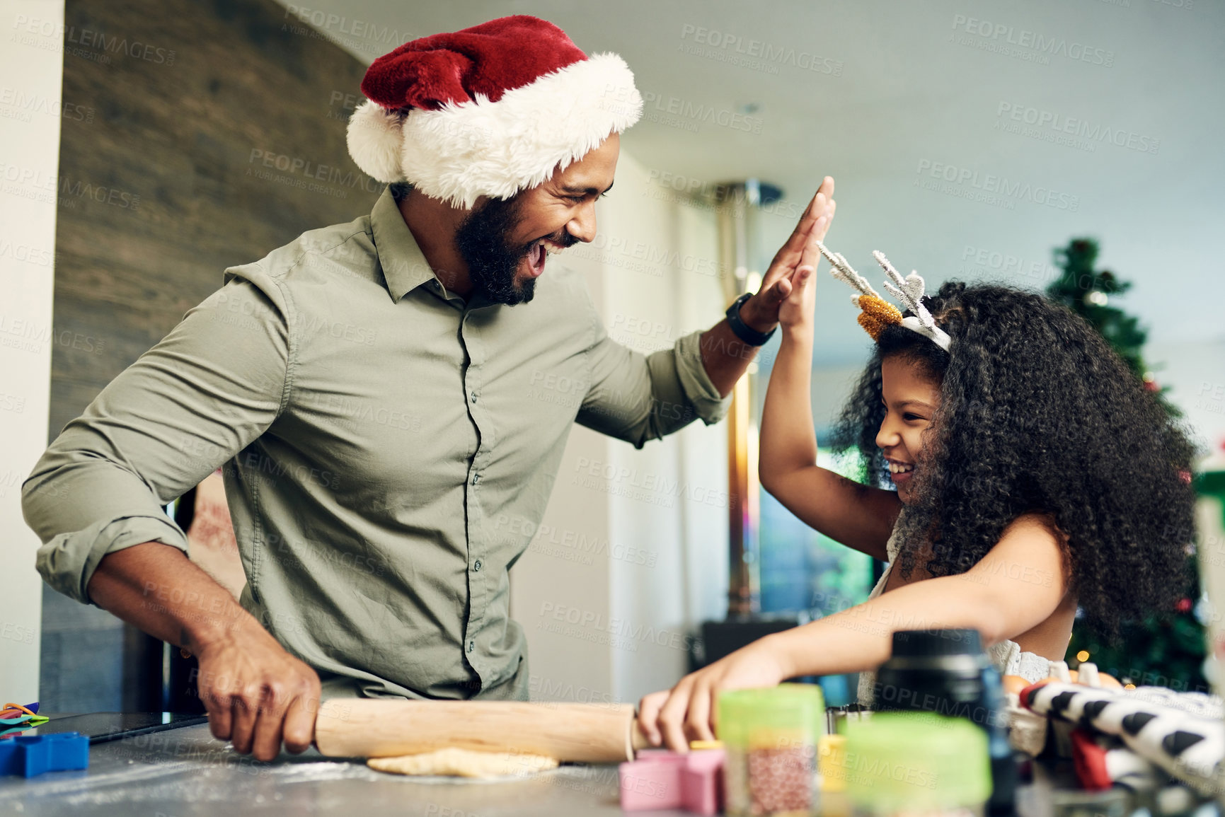 Buy stock photo Christmas baking, father and girl high five, learning and success in kitchen with recipe or ingredients with happy smile. Family, bake and celebration, support and excited for xmas cookies on holiday