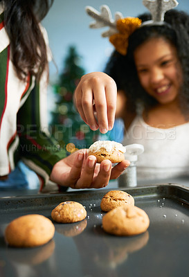 Buy stock photo Hands, cookies and baking with a mother and daughter in the kitchen on Christmas for the festive season. Family, children and food with a woman and girl learning hoe to bake together at home