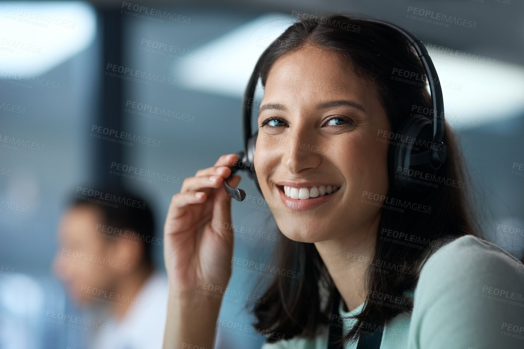 Buy stock photo Portrait of a young woman using a headset in a modern office