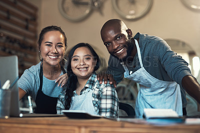 Buy stock photo Portrait of three young working using a laptop at work