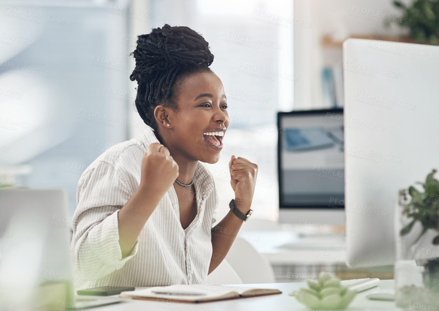 Buy stock photo Shot of a young business celebrating by cheering in her office