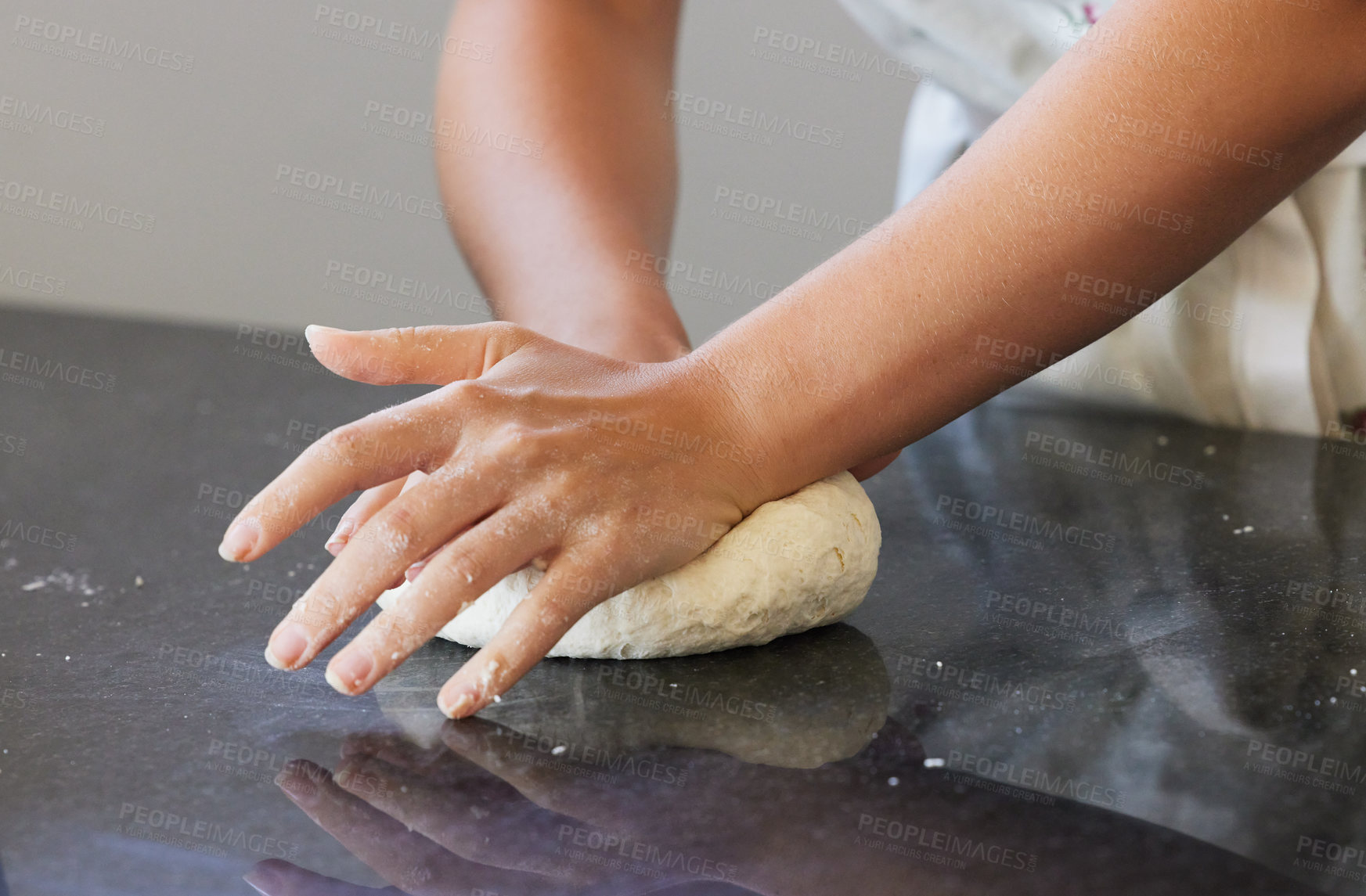 Buy stock photo Person, hands and kneading dough in kitchen or baking bread for morning breakfast, cooking or dessert. Chef, counter and wheat production for pizza meal or learning recipe, preparing or restaurant