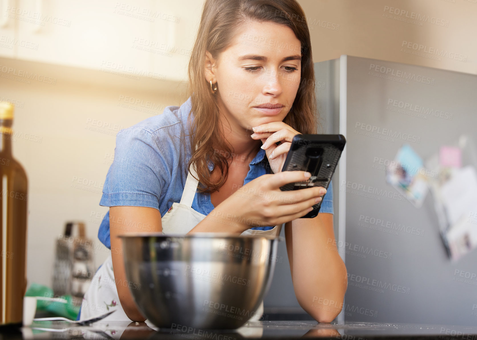 Buy stock photo Typing, kitchen and woman with phone for cooking breakfast, internet and video tutorial for healthy recipe. Mobile, chef girl and research for vegan food website for weight loss and wellness in home