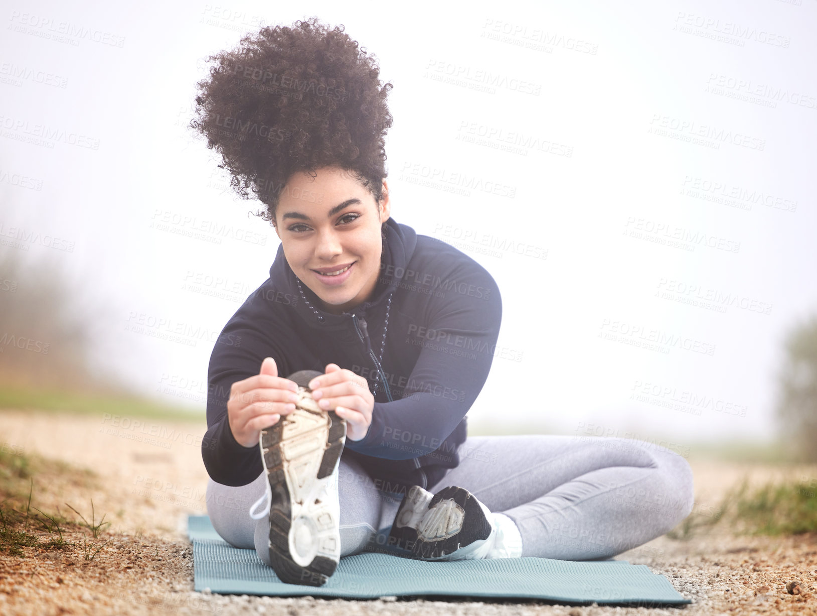 Buy stock photo Girl, runner and stretching in morning fog on ground for health, fitness and wellness in portrait. Woman, person and athlete in workout, training and outdoor for muscle, nature and winter in Canada