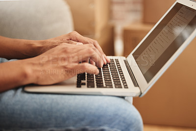 Buy stock photo Shot of an unrecognizable person using a laptop at home