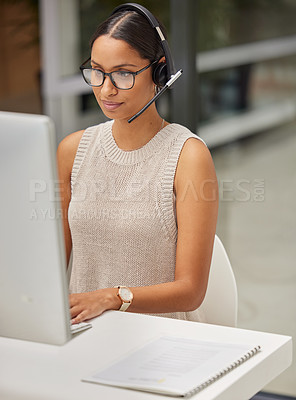 Buy stock photo Business woman, call center and web support communication at a computer in a office. Phone conversation, professional and worker with contact us, crm and customer service job in a consulting agency