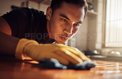 Buy stock photo Kitchen counter, wipe and man with gloves for cleaning, safety and surface with dust at home. Housework, male person or professional cleaner with cloth or fabric for housekeeping, service or hygiene