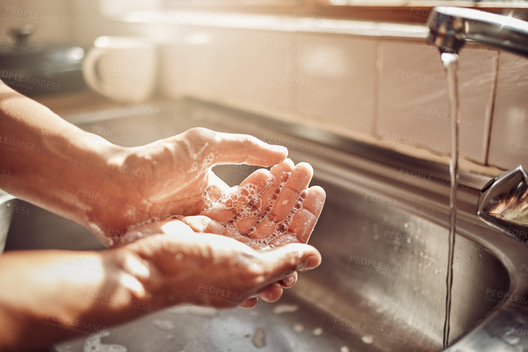 Buy stock photo Soap, water and cleaning hands in kitchen for hygiene, health and wellness in home to clean skin. Tap, sink and skincare, hand wash with cleansing foam and bubbles for germ and bacteria protection.