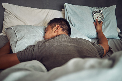 Buy stock photo Man, sleeping and bed with alarm clock or tired insomnia for bad time management, depression or dreaming. Male person, pillow and lazy snooze in home or overworked burnout, mental health or Monday