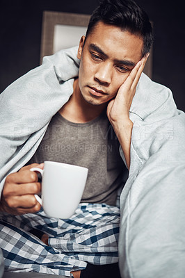Buy stock photo Asian man, drink and home with sick cold with fatigue or green tea for health, benefits or vitamins. Male person, tired and morning wake up with illness or hot beverage, sore throat or immune system
