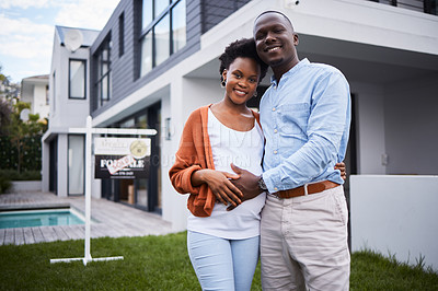 Buy stock photo Black couple, family and real estate in new home, property or mortgage loan together outdoors. Portrait of happy African man and woman with hug in relocation for house, homeowner or building asset
