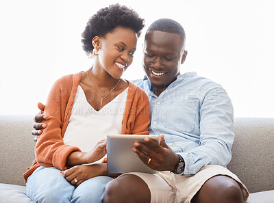 Buy stock photo Love, social media and tablet with black couple on sofa in living room of home for browsing together. App, smile or technology with happy man and woman in apartment for internet video streaming