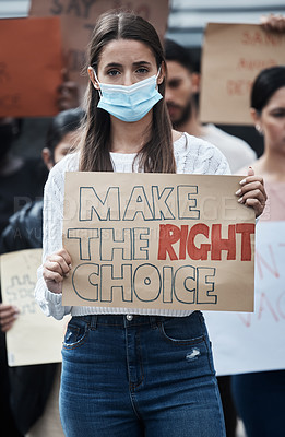 Buy stock photo Protest poster, woman and face mask portrait with fight, human rights and rally sign in city. Urban, group and protesting people with a female person holding pro vaccine movement signage on a street