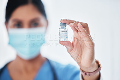 Buy stock photo Shot of a medical practitioner holding a vial with 