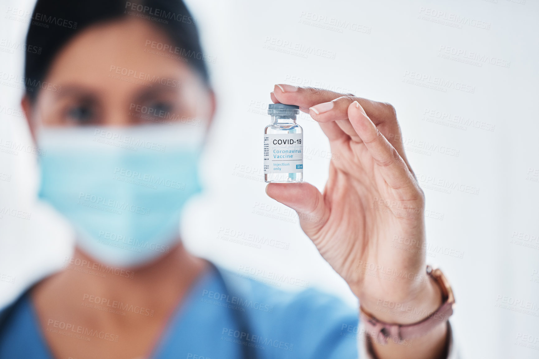 Buy stock photo Shot of a medical practitioner holding a vial with 