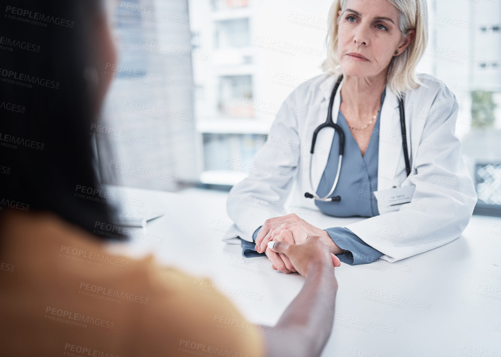 Buy stock photo Consulting, support and holding hands of doctor and patient for medical, empathy and advice. Medicine, healthcare and help with women in hospital exam room for depression, compassion and hope