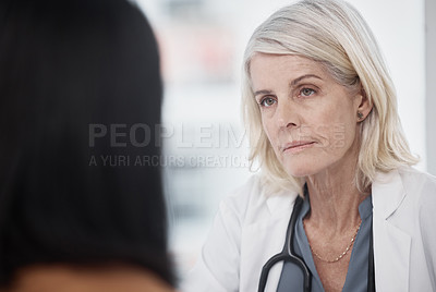 Buy stock photo Shot of a doctor having a consultation with a patient