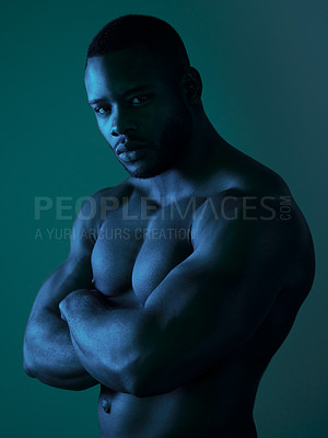 Buy stock photo Portrait of a handsome young man posing topless in studio