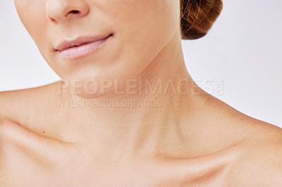 Buy stock photo Shot of a womans glowing skin against a studio background